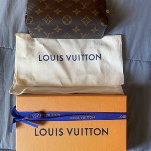 Louis Vuitton Cosmetic bag. New with duster bag. Never used.